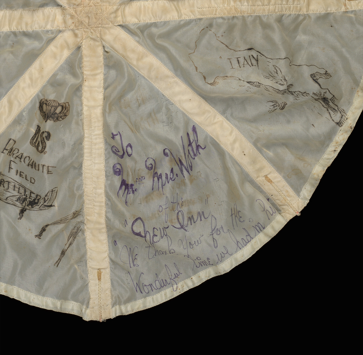 Detail of parachute given to landlords of The New Inn, Hinckley by the 82nd Airborne div. Inscribed 'To Mr and Mrs Worth of the New Inn. we thank you for the wonderful time we had in here"